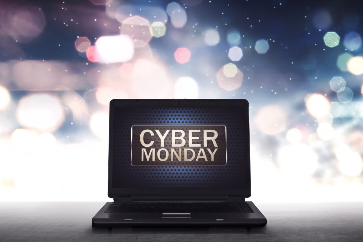 cyber Monday written on laptop with blurred winter background