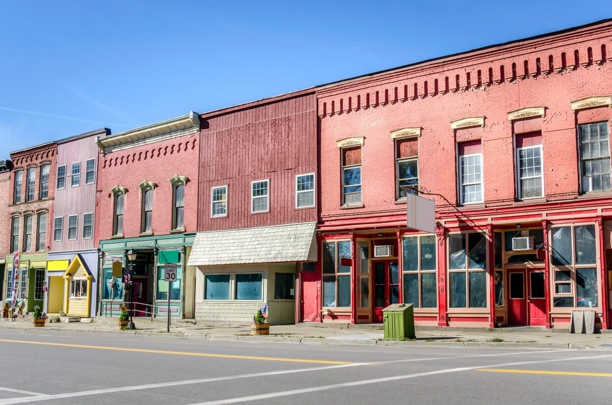 Historic Buildings along Street with Colourful Storefronts