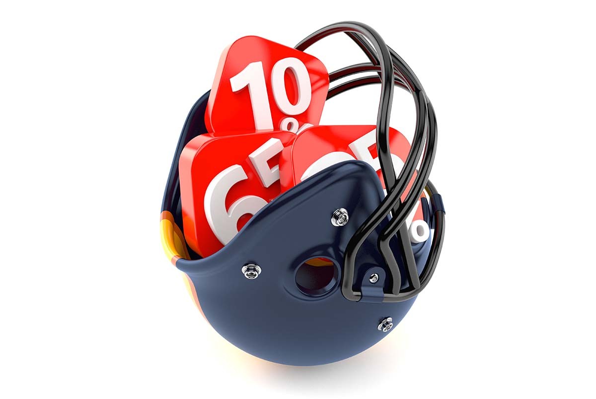 Football helmet with percent symbols isolated on white background