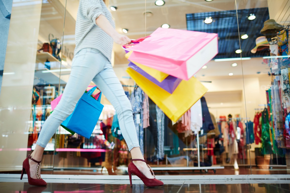 Female walking in shopping mall